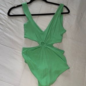 Green bodysuit with O-ring and side cut outs